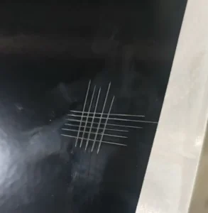 Grid test on coating for battery cooling plate