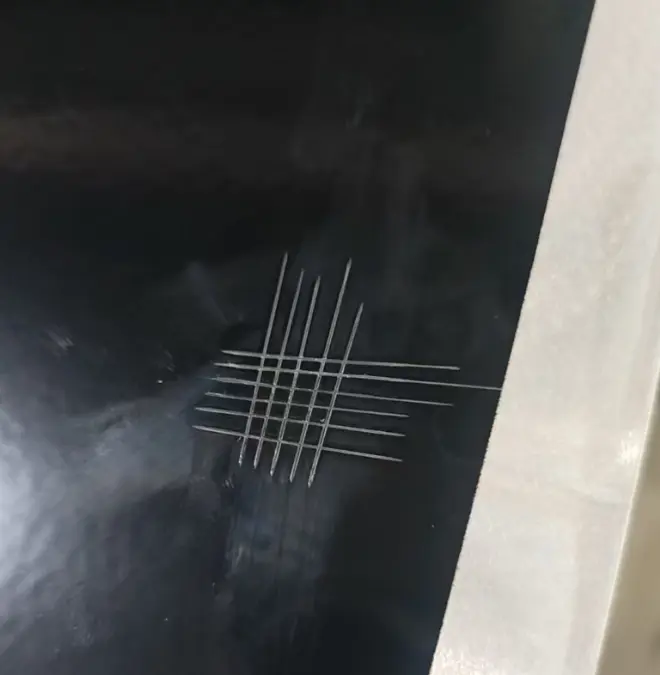 Grid test on coating for battery cooling plate